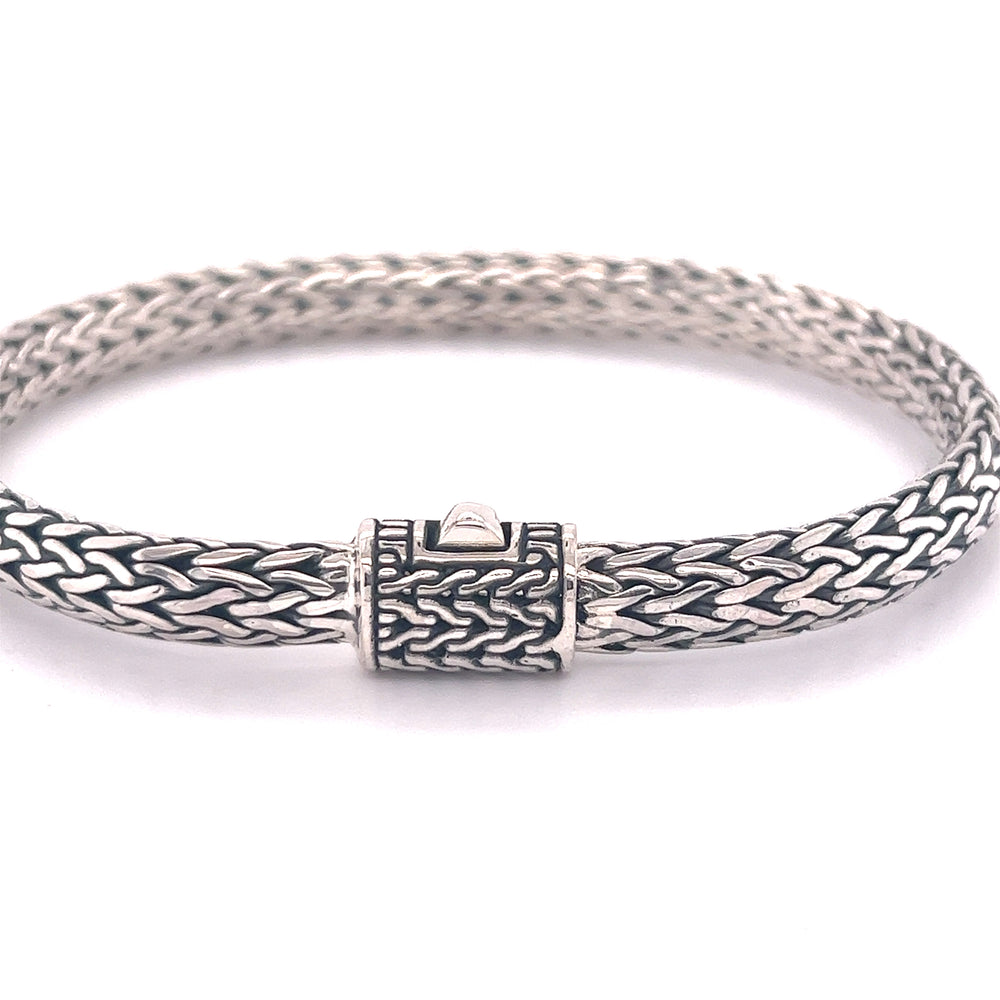 
                  
                    A comfortable Super Silver 4X6MM Braided Rope Bracelet with a braided clasp.
                  
                