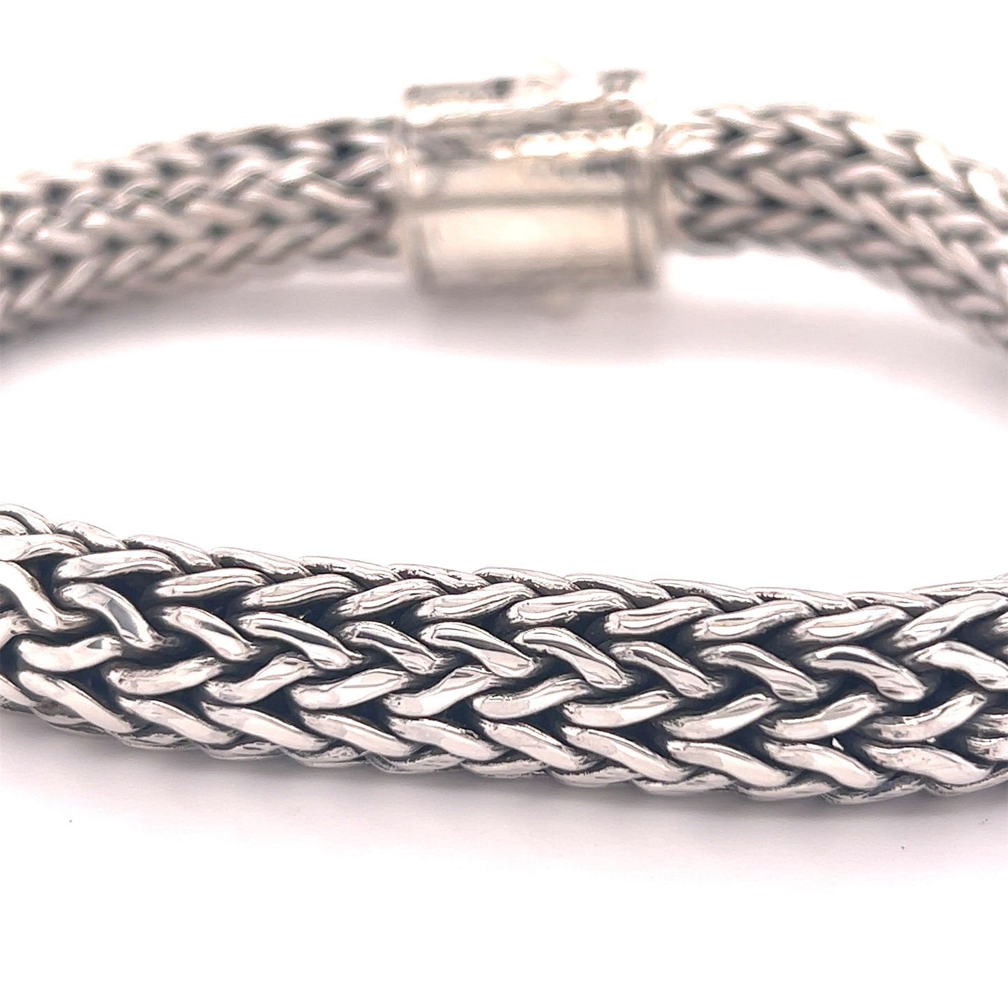 
                  
                    A Super Silver Heavy Braided Bracelet with a braided clasp.
                  
                