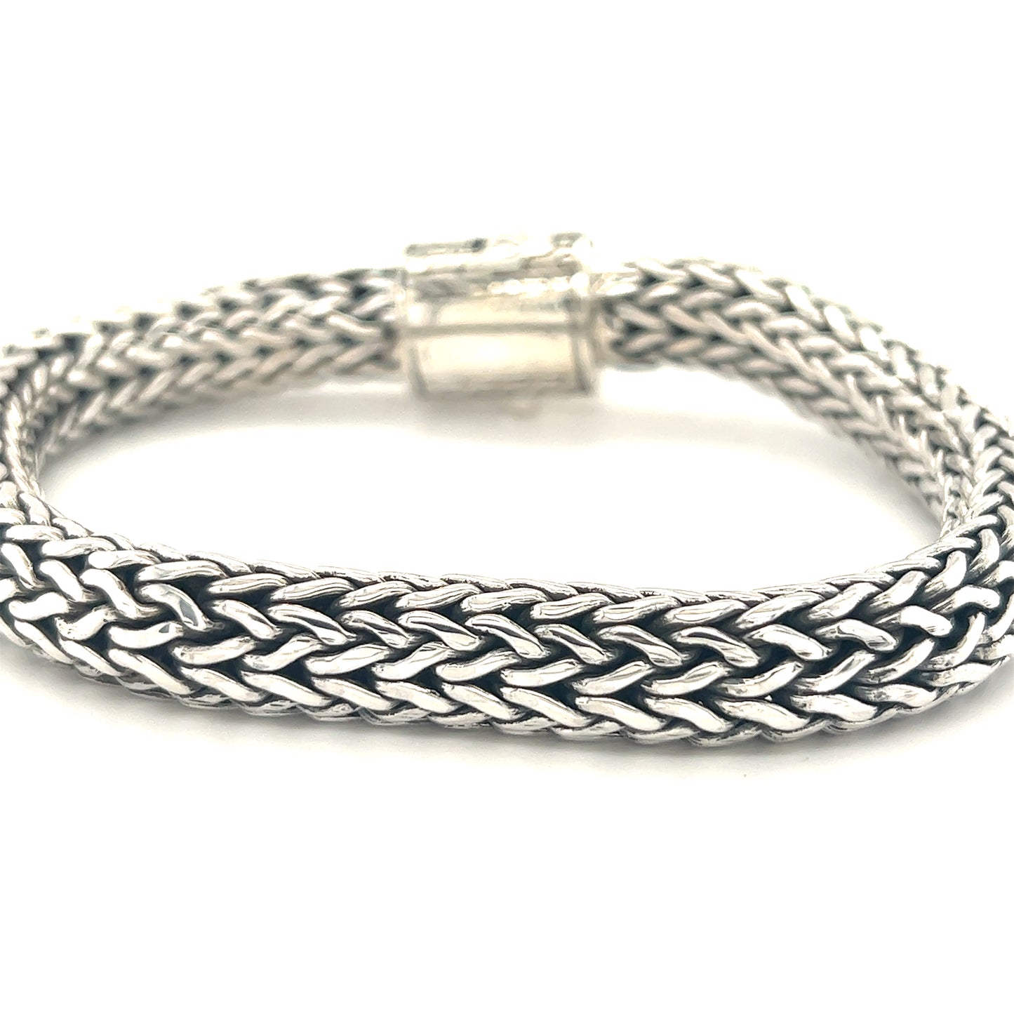 A Super Silver Heavy Braided Bracelet with a snap clasp on a white background.