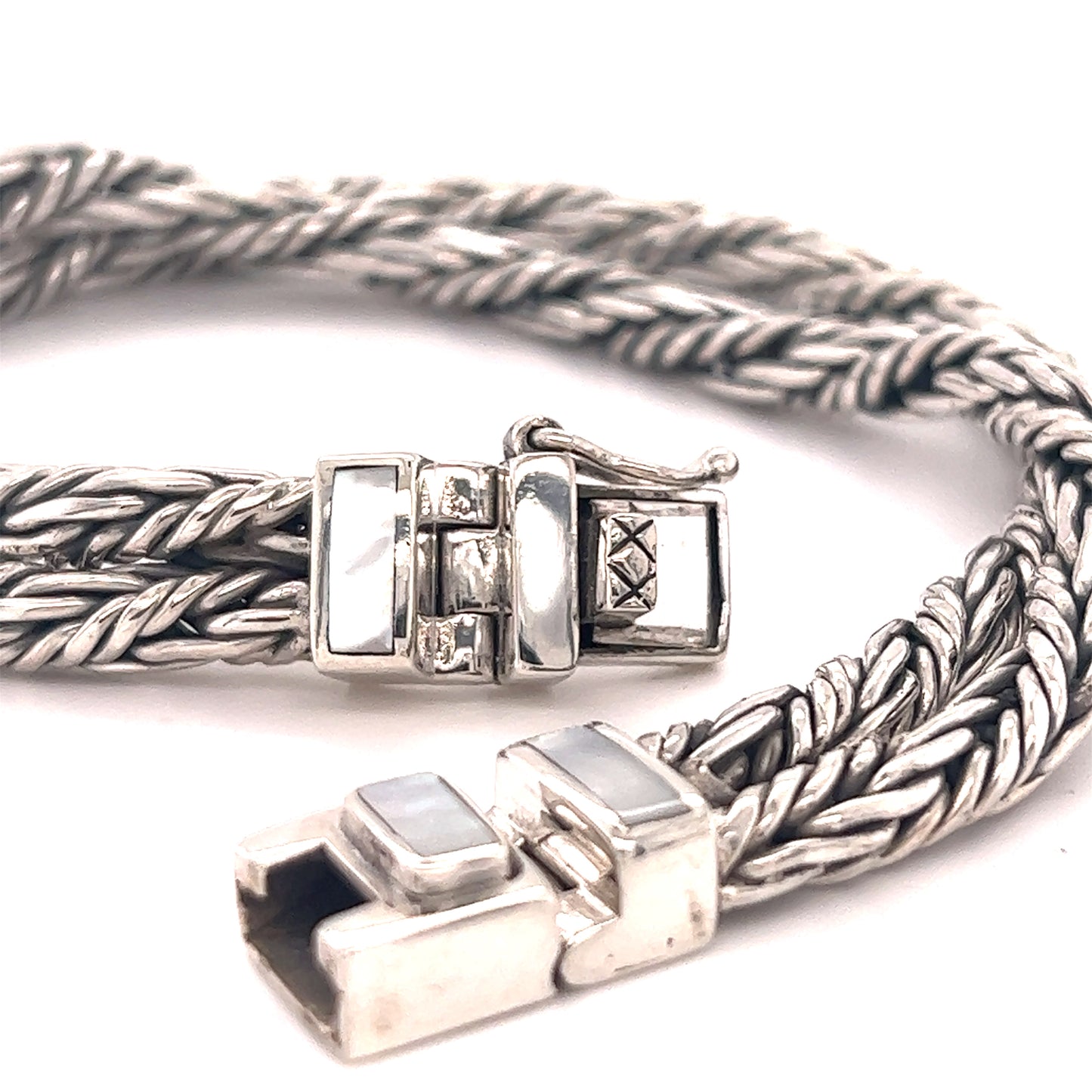 
                  
                    A Super Silver Double Twisted Braided Rope Bracelet with two clasps.
                  
                