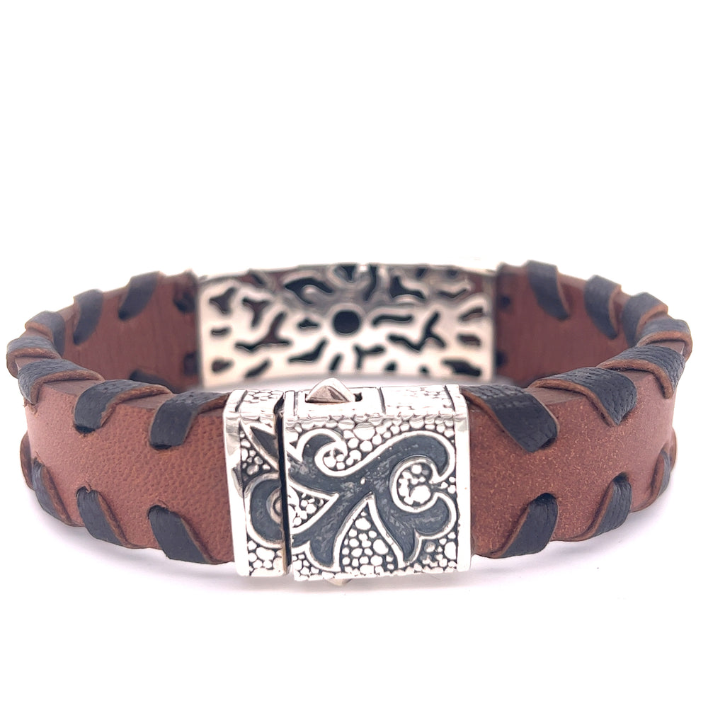 
                  
                    A Tribal Leather Bracelet with a unique design and a Super Silver buckle.
                  
                