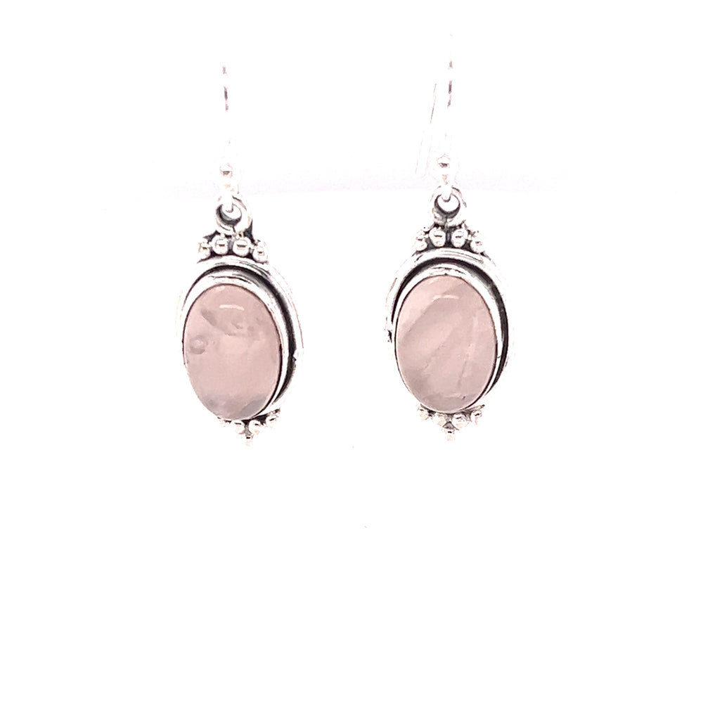
                  
                    These Super Silver natural gemstone earrings feature a beautiful rose quartz stone and are crafted with sterling silver.
                  
                