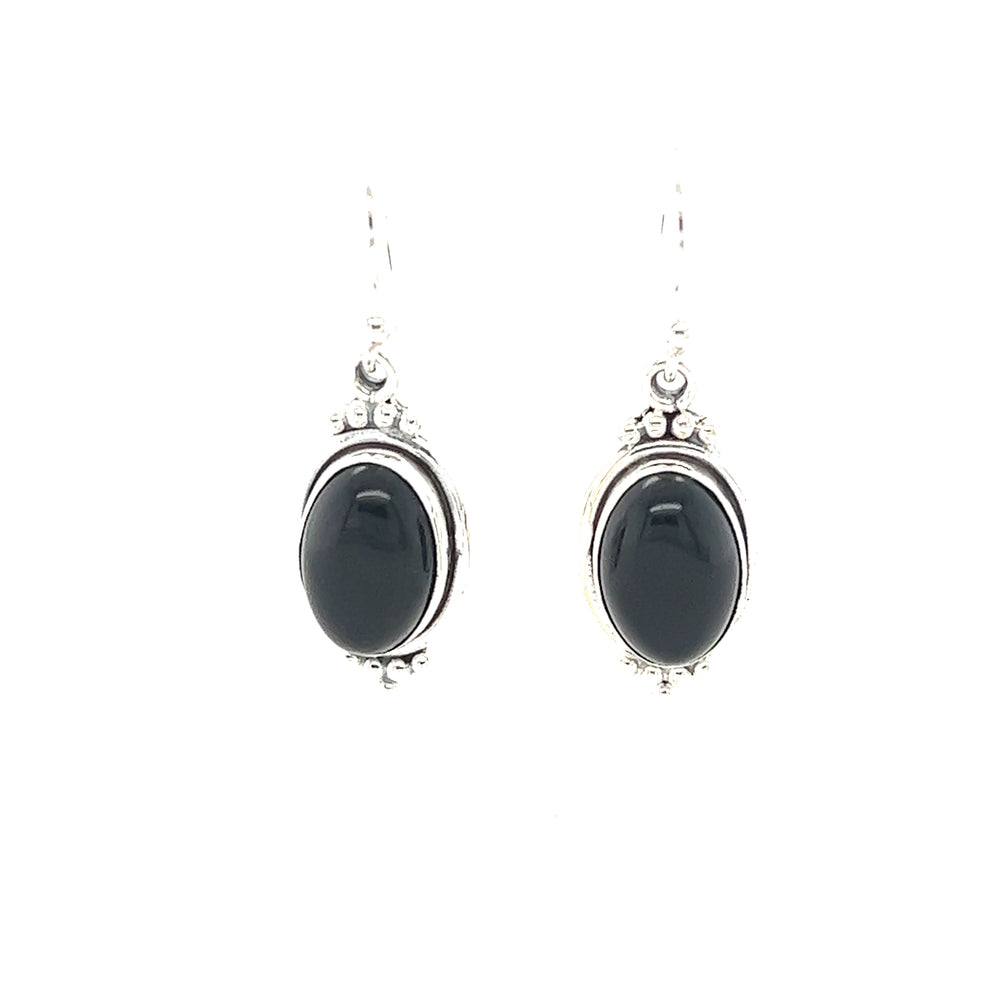 
                  
                    A pair of Super Silver Natural Gemstone Earrings with a Raised Oval Setting on a white background.
                  
                
