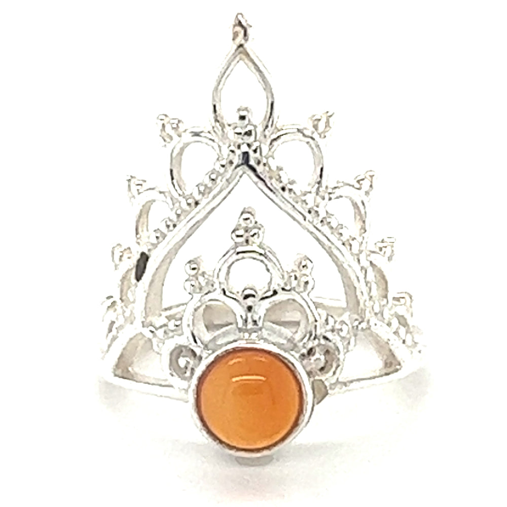 
                  
                    A Henna Crown Ring with Natural Gemstones with a cabochon stone in the center.
                  
                