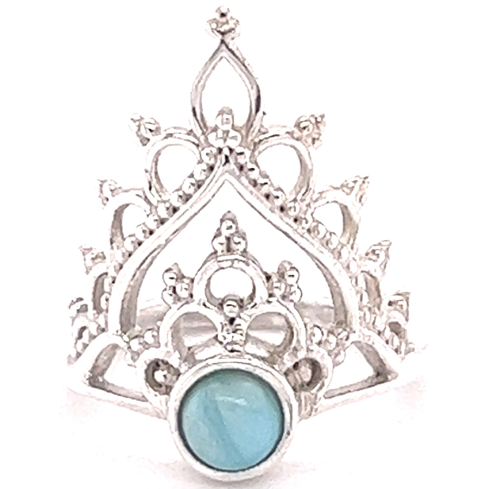 
                  
                    A Henna Crown Ring with Natural Gemstones with a turquoise stone.
                  
                