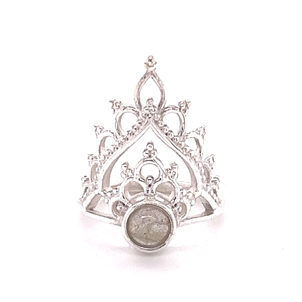 
                  
                    A Henna Crown Ring with Natural Gemstones with a cabochon stone in the middle.
                  
                