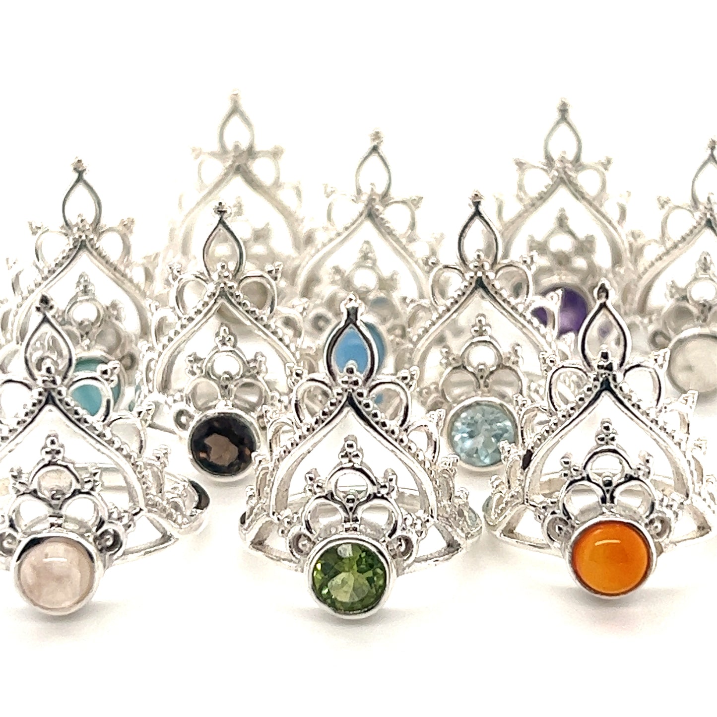 A collection of Henna Crown Rings with Natural Gemstones adorned with colorful stones.