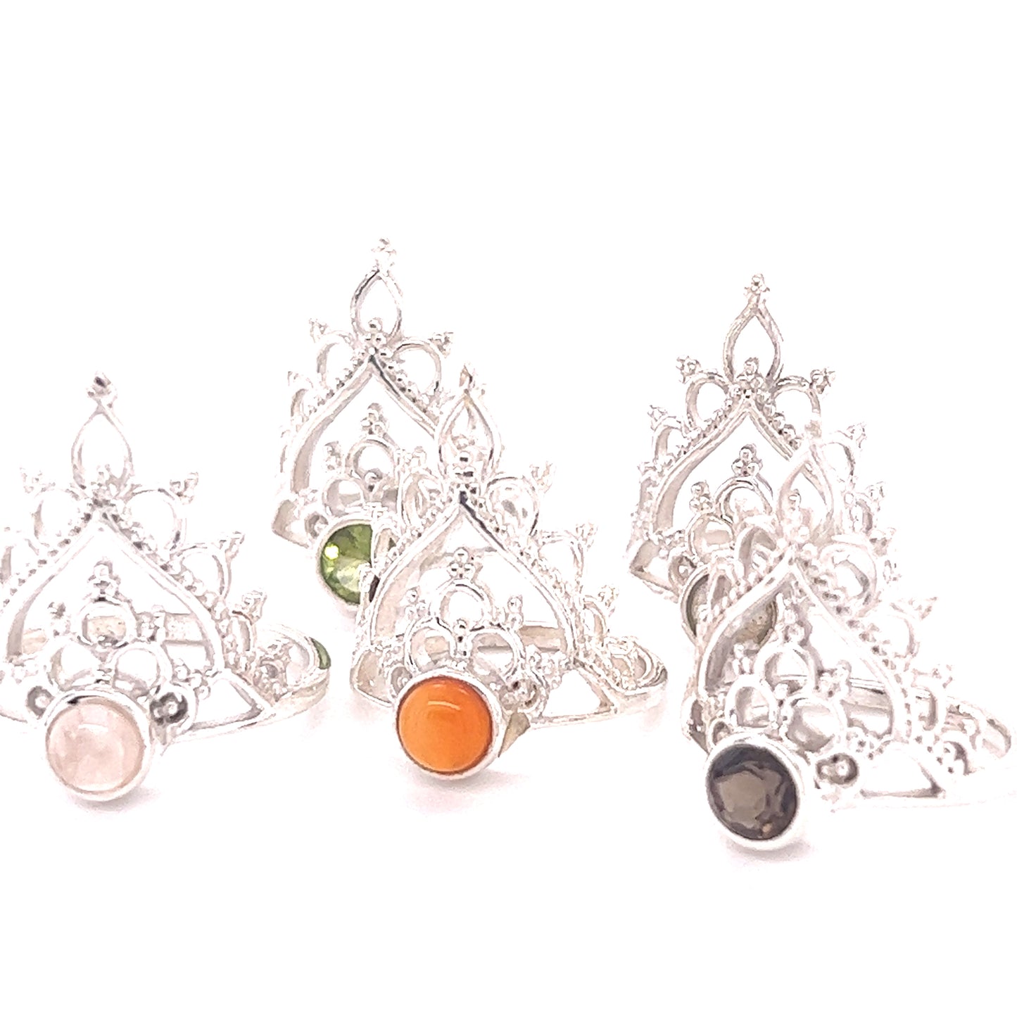 
                  
                    A set of four Henna Crown Rings with Natural Gemstones adorned in sterling silver.
                  
                