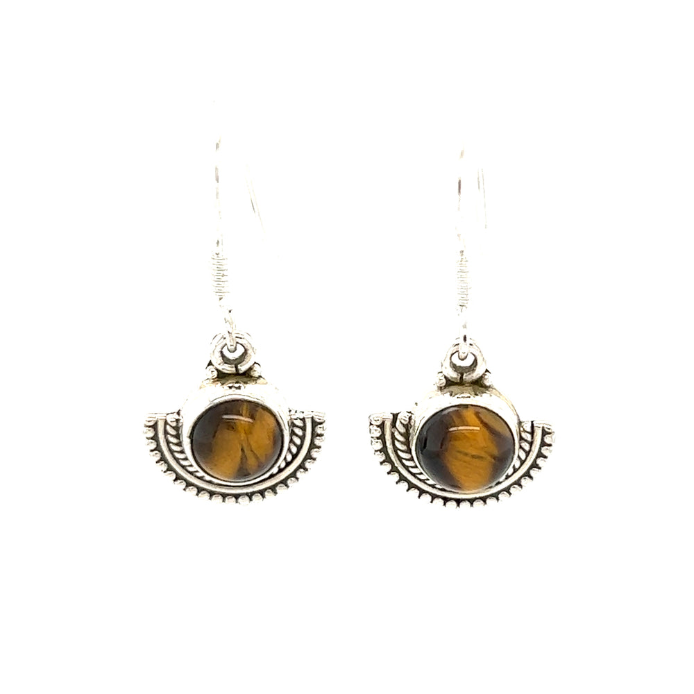 
                  
                    Super Silver's Round Gemstone Earrings with Fan Setting feature a round tiger eye stone set in a rustic silver fan-like setting.
                  
                