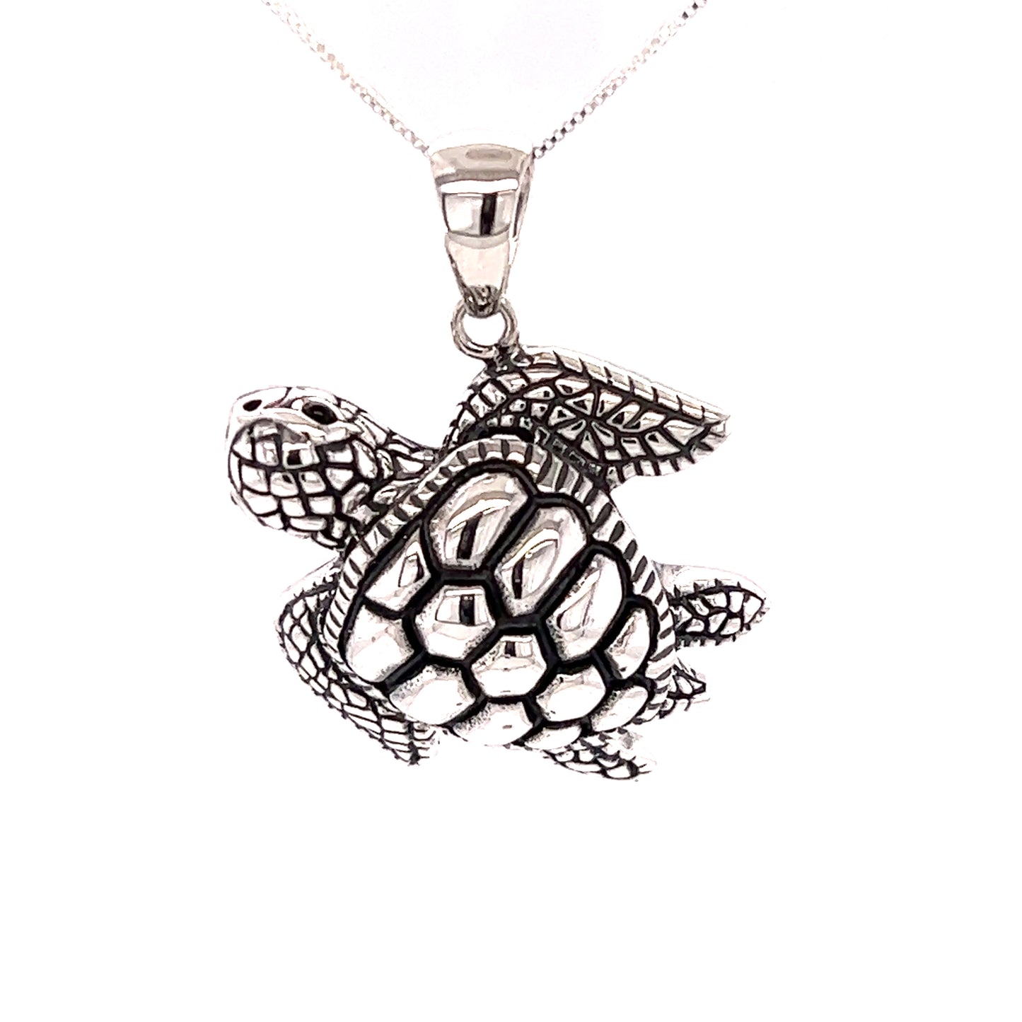 
                  
                    A Stunning Sea Turtle Pendant by Super Silver on a chain.
                  
                