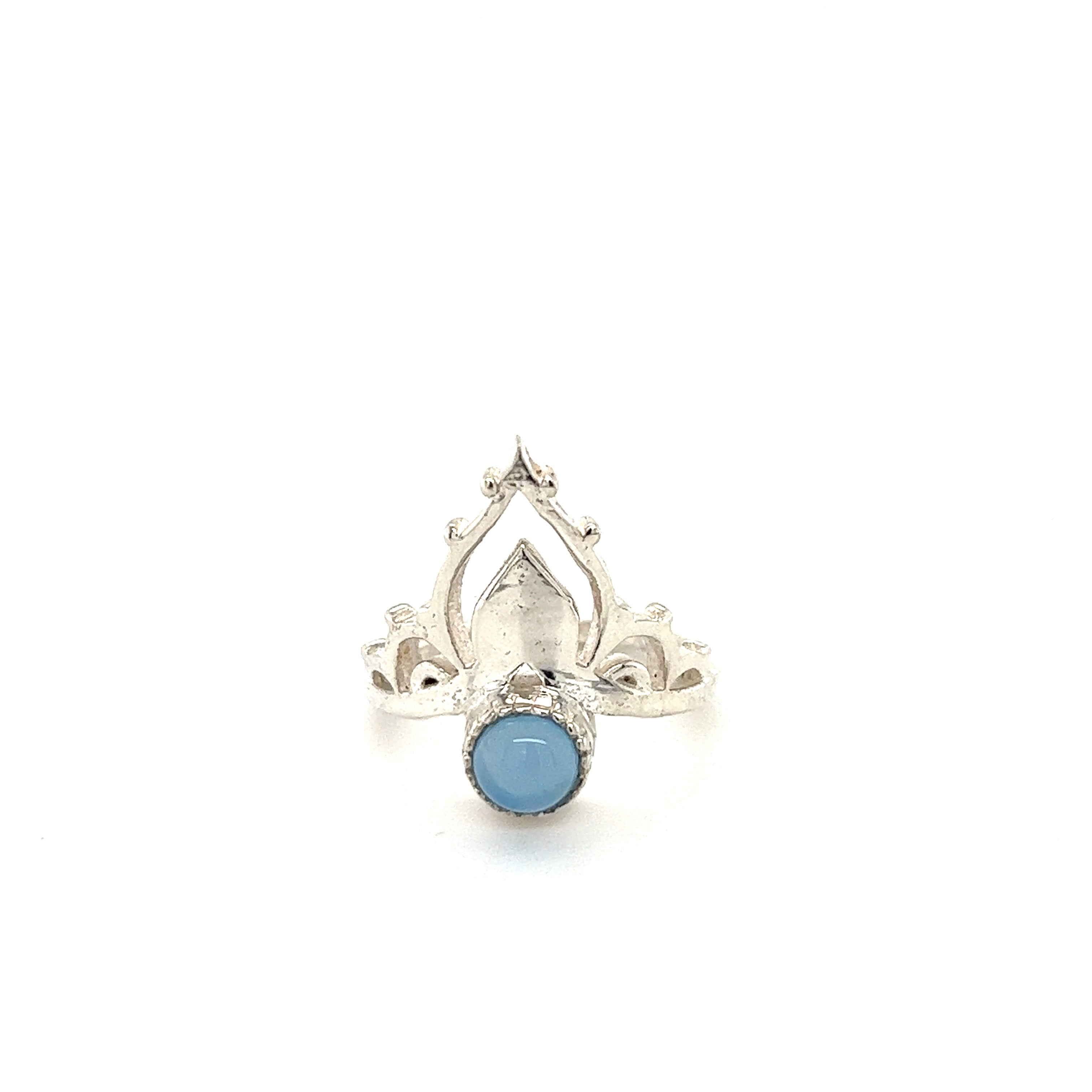 A Mandala Crown Ring with Natural Gemstones with a cabochon stone.