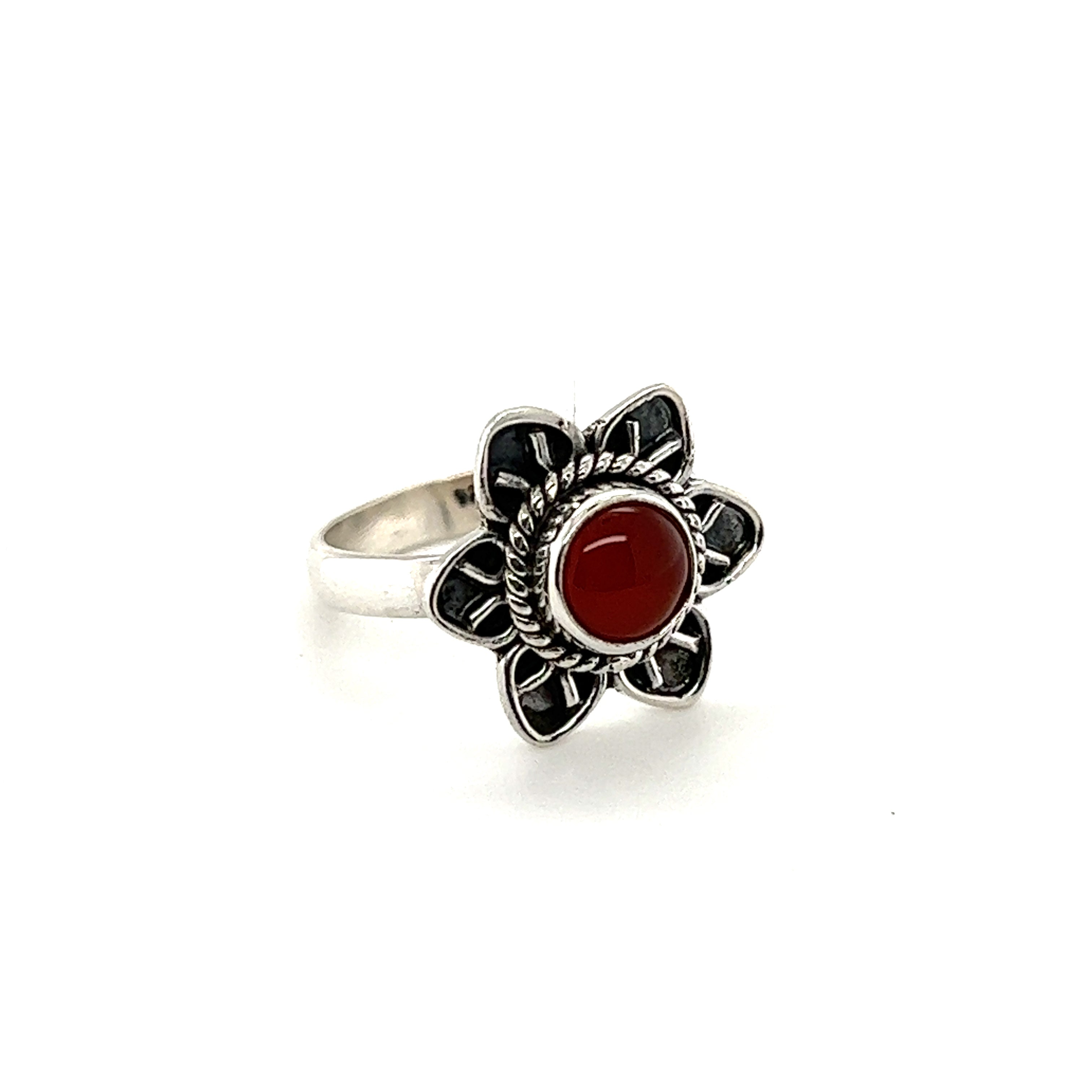 A Enchanting Flower Ring with Natural Gemstones from Super Silver, with a red gemstone in the center.