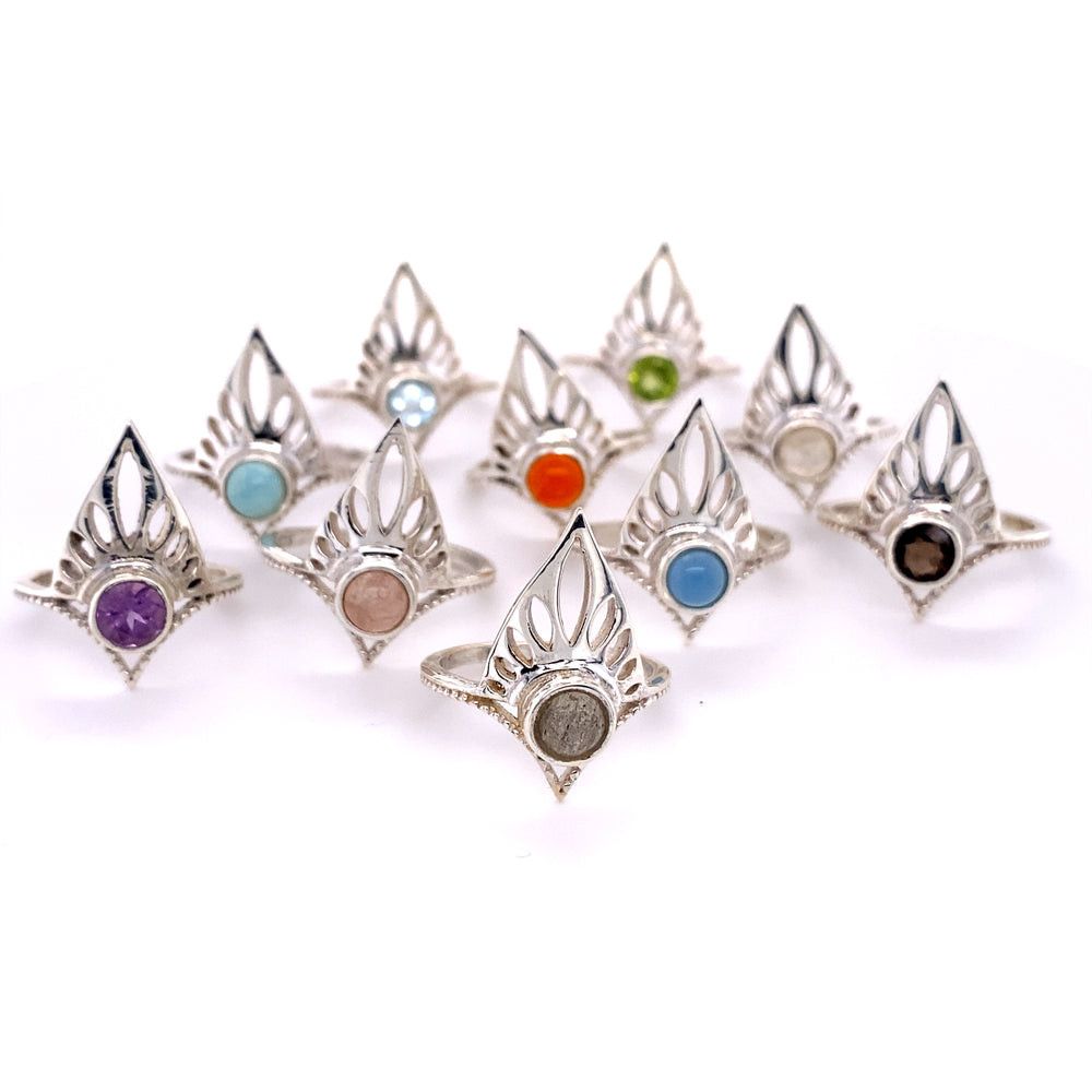 A group of Henna Shield Rings with Natural Gemstones in different colors.