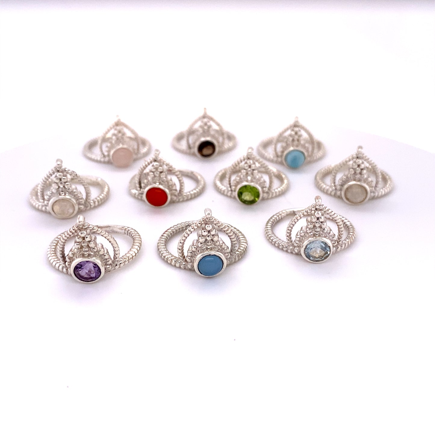 A Simple Tiara Ring with Natural Gemstones in various colors.