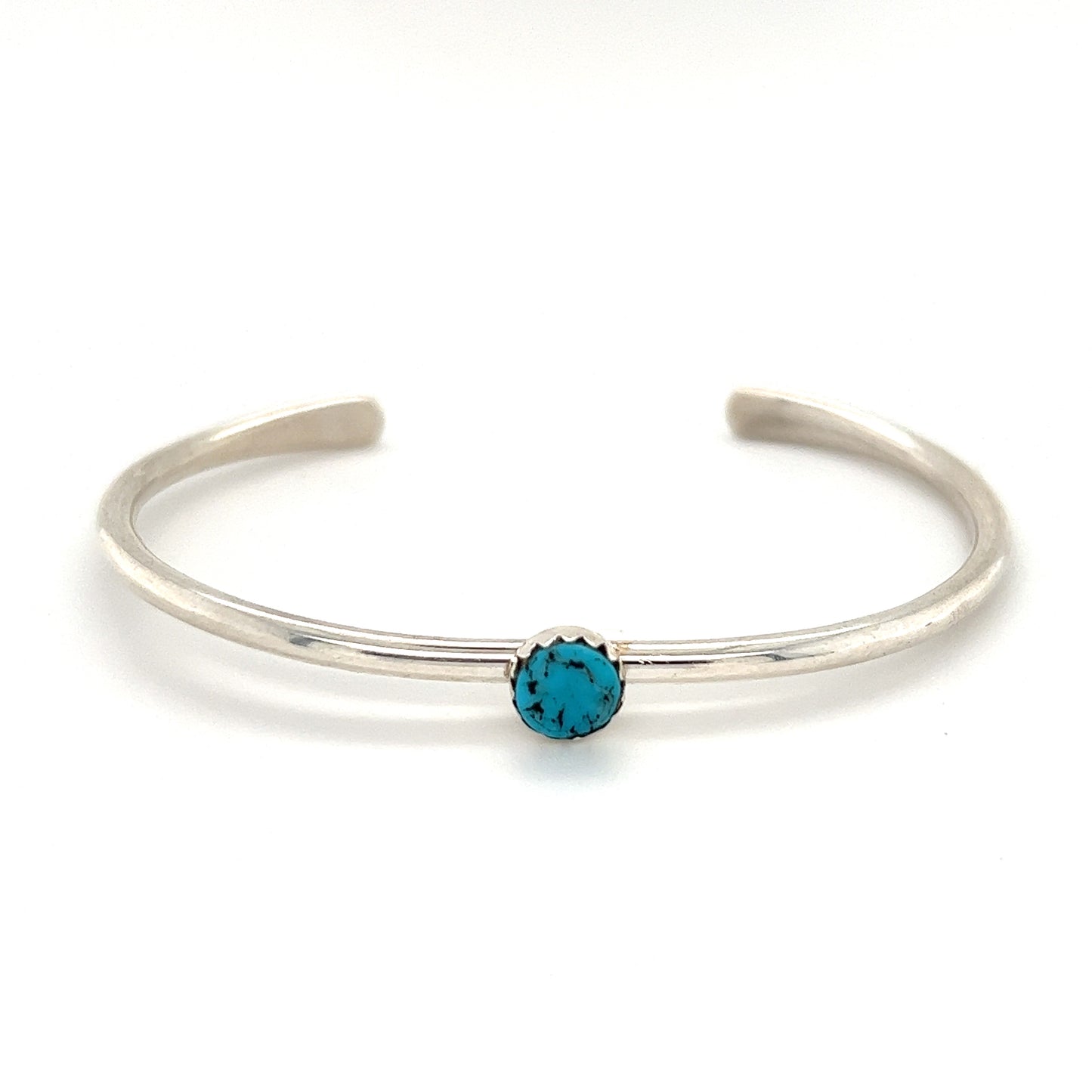 
                  
                    A Stackable Native American Turquoise Cuff bracelet with a Kingman Turquoise stone by Super Silver.
                  
                