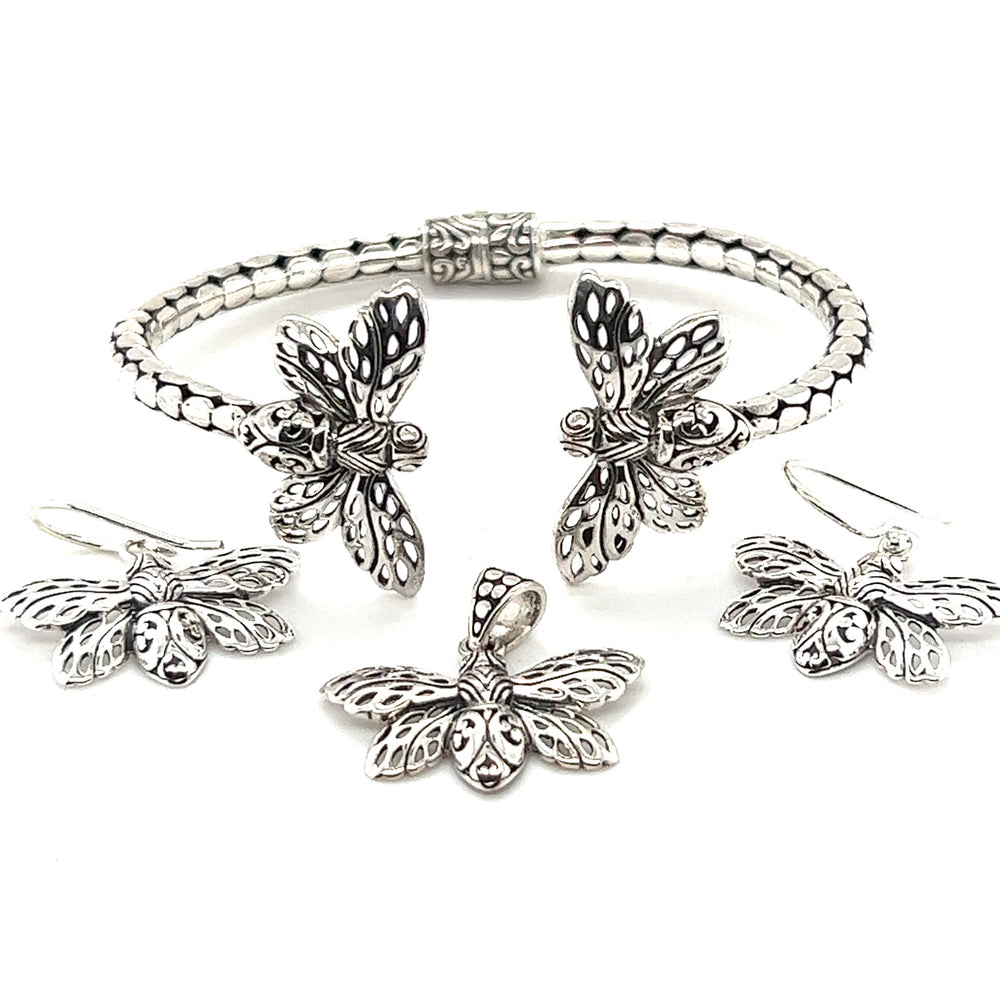 
                  
                    Super Silver's .925 Sterling Silver Bee Pendant cuff bracelet and earring set from the Artisan Collections.
                  
                