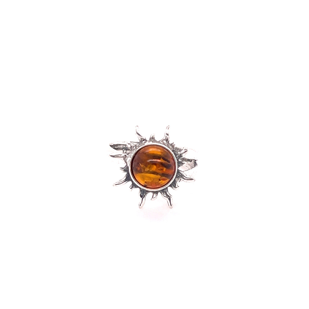 A Super Silver Glowing Amber Sun Ring adorned with a stunning amber stone, sourced from the Baltics.
