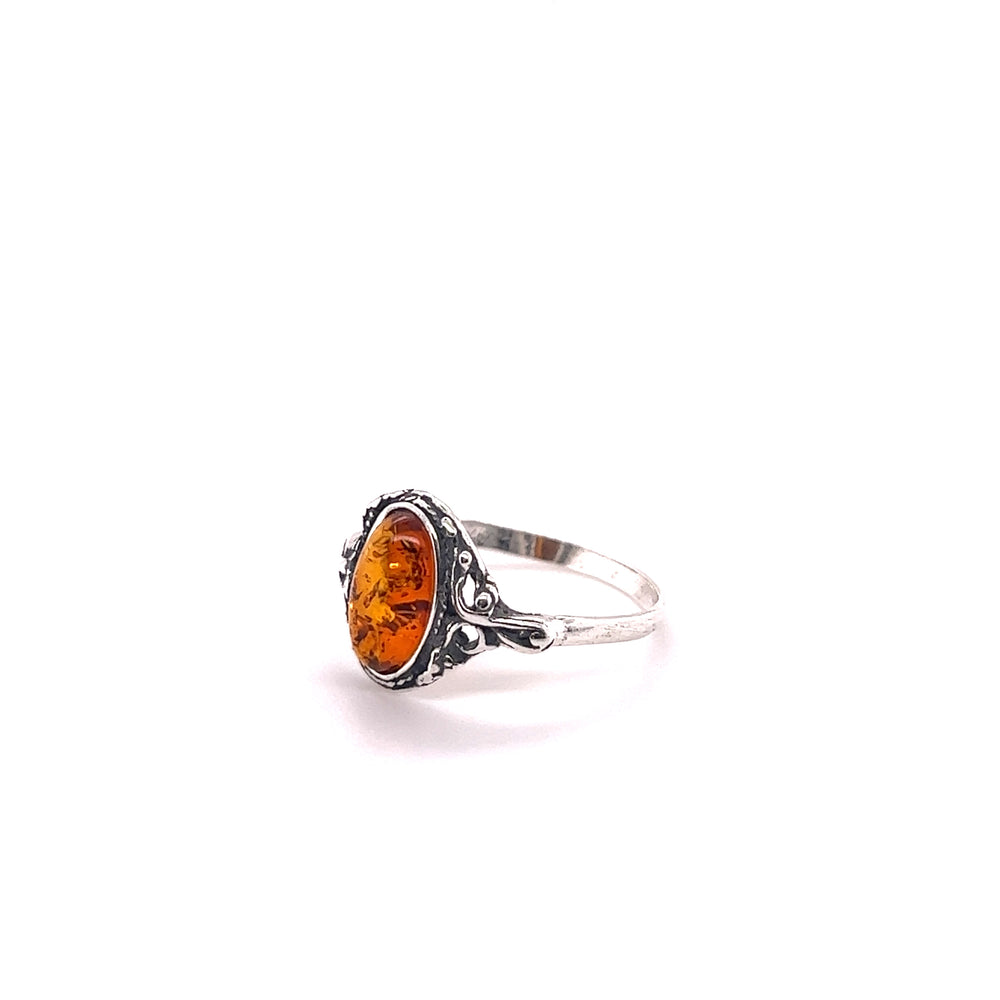 
                  
                    Delicate Baltic Amber Ring with Antique Setting
                  
                