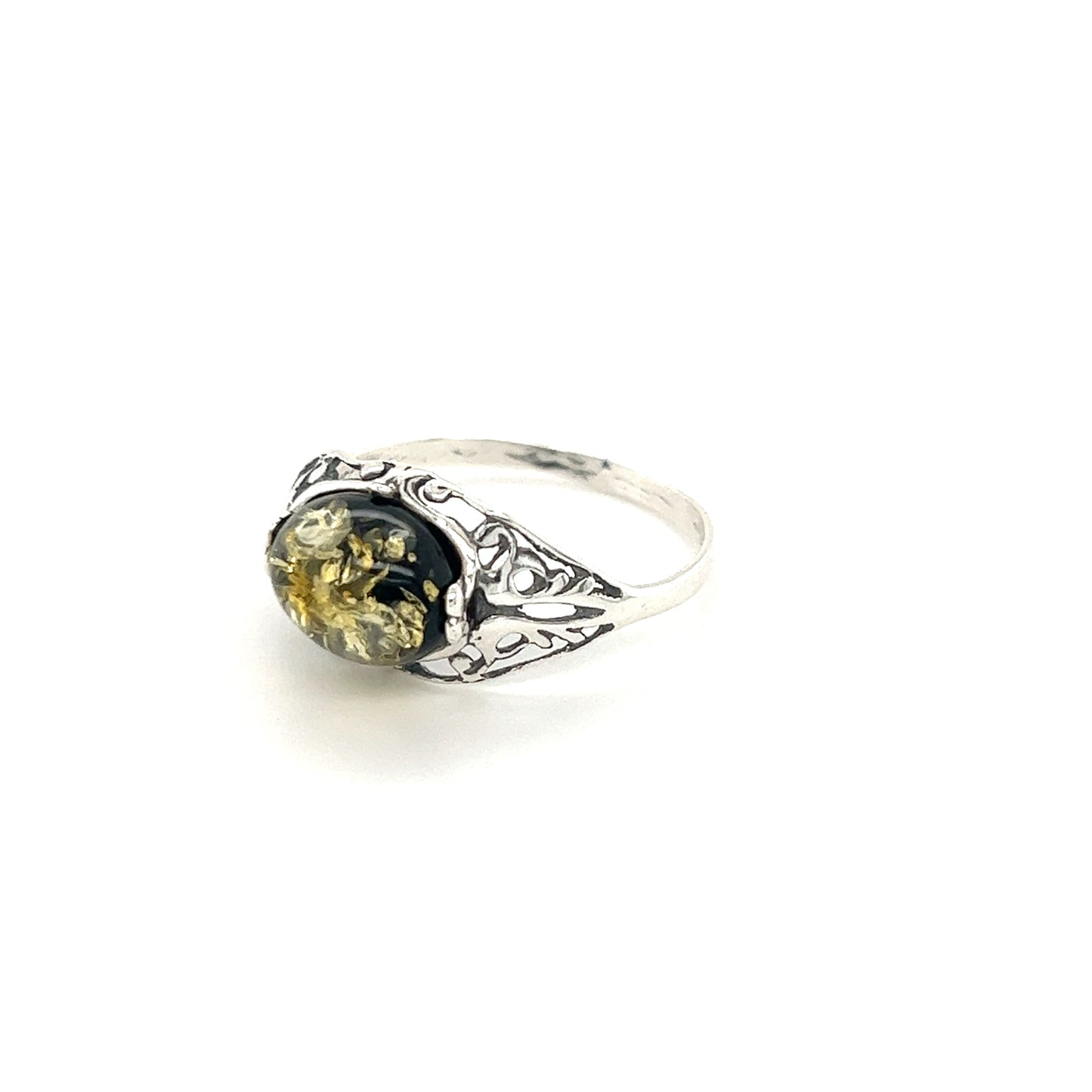 
                  
                    A Glowing Green Baltic Amber Ring with a black and Baltic amber stone by Super Silver.
                  
                
