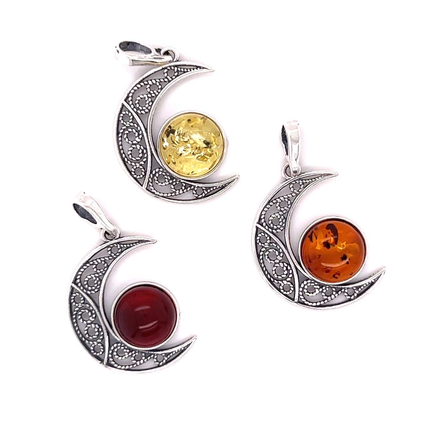 Three Super Silver Baltic Amber Moon Pendants with moonstone accents in .925 Sterling Silver.