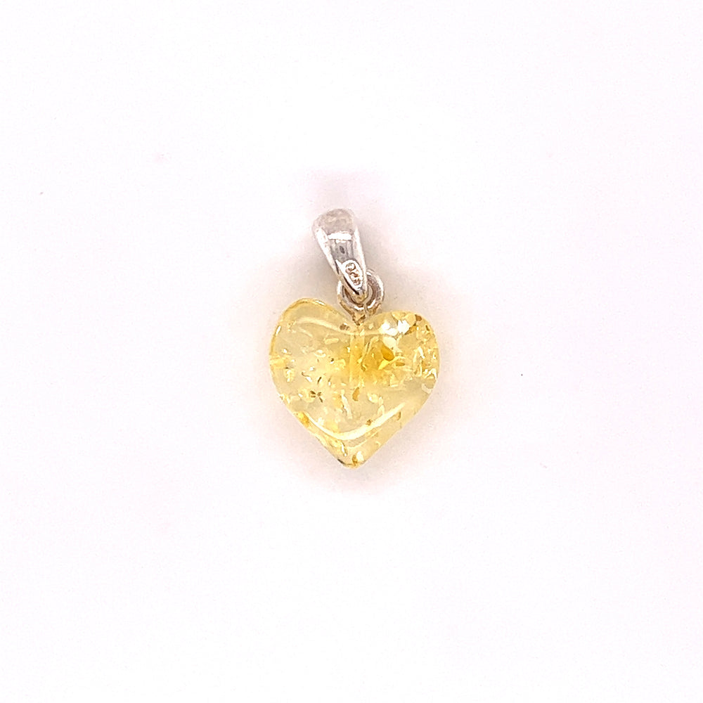 
                  
                    A small Charming Baltic Amber Heart Pendant on a .925 Super Silver background.
                  
                