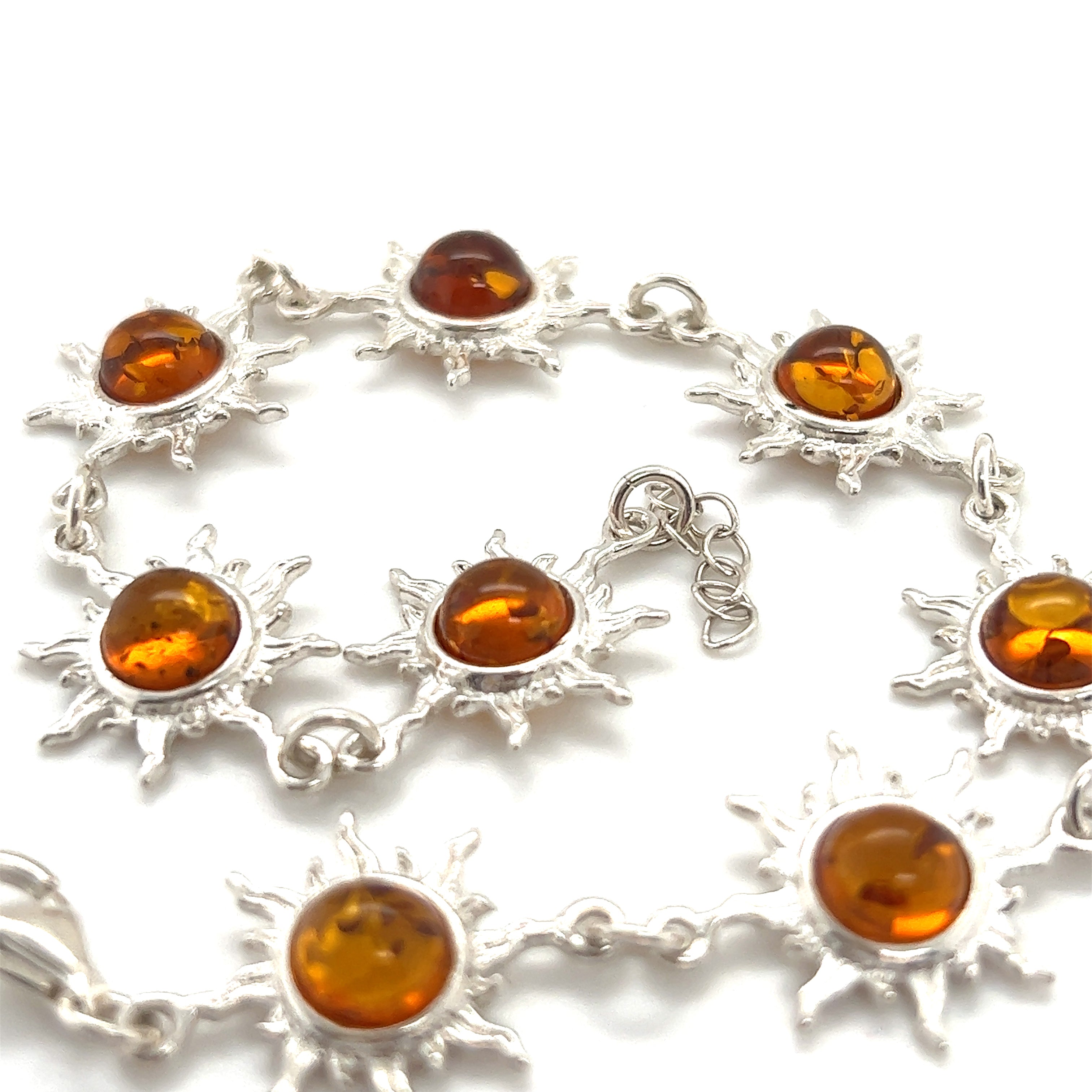 Super Silver Sparkling Amber Sun Bracelet with silver sunbursts.