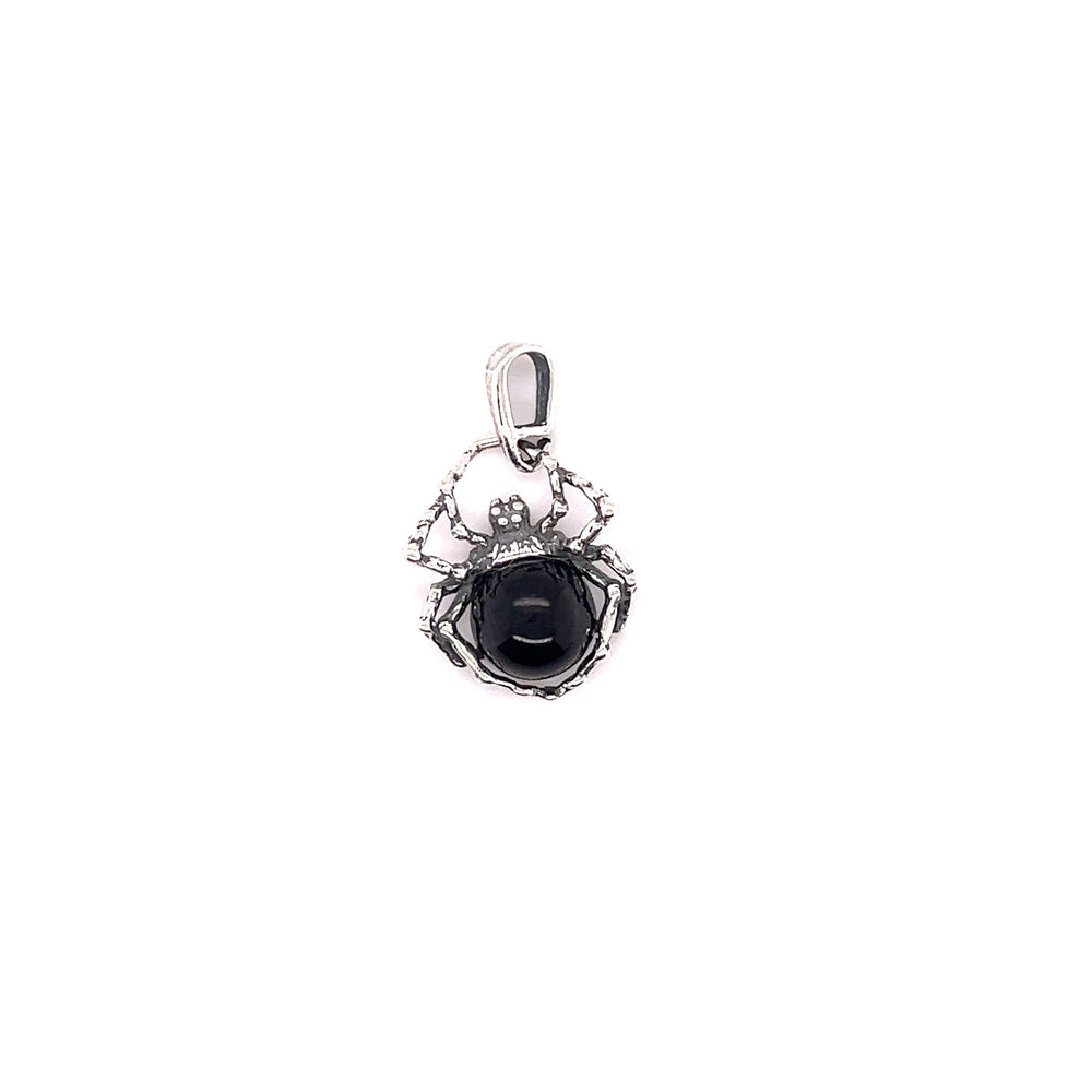 A Super Silver delicate Baltic Amber Spider Pendant with a captivating black onyx stone.