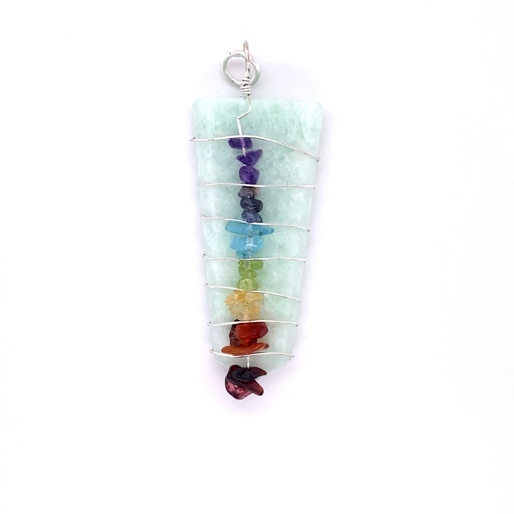
                  
                    A Stone Slab Wire-Wrapped Chakra Pendant with seven chakra stones, perfect for crystal and chakra stone enthusiasts.
                  
                