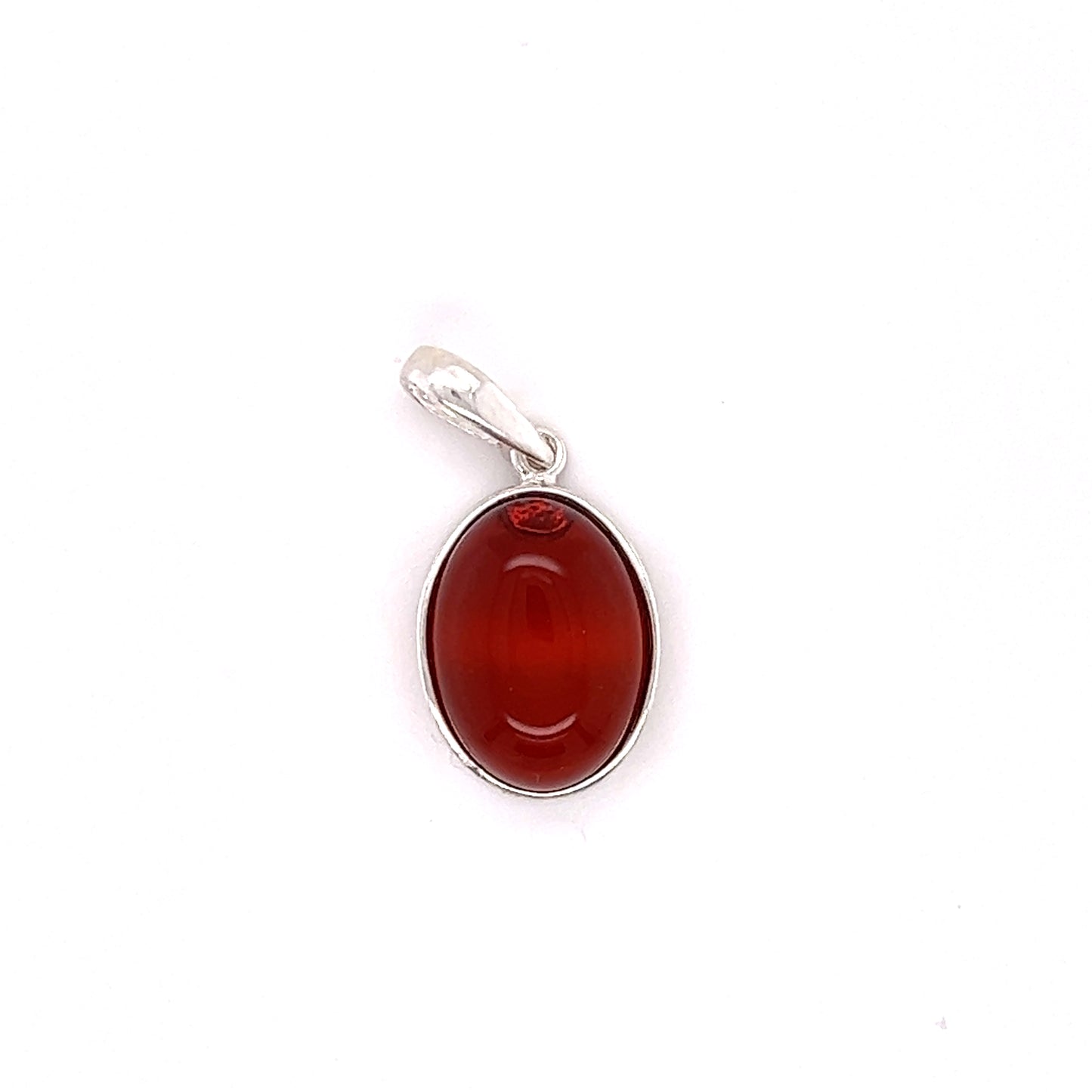 
                  
                    A Timeless Oval Amber Pendant by Super Silver with a red stone showcasing healing properties.
                  
                