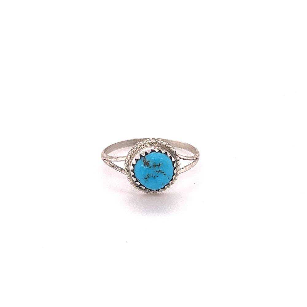 A cultural Classic Round Handmade Turquoise Ring with a turquoise stone.