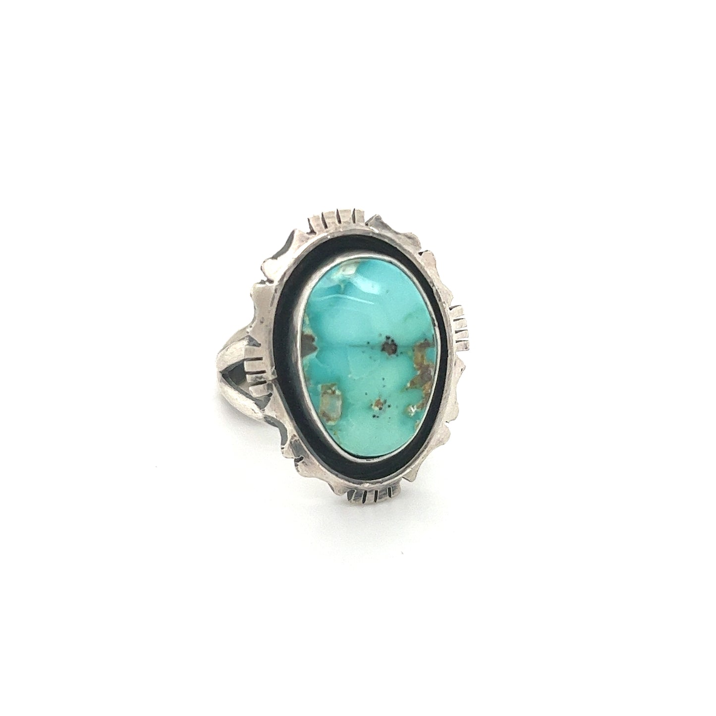 A cultural sterling silver ring with a Stunning Native American Turquoise Ring.