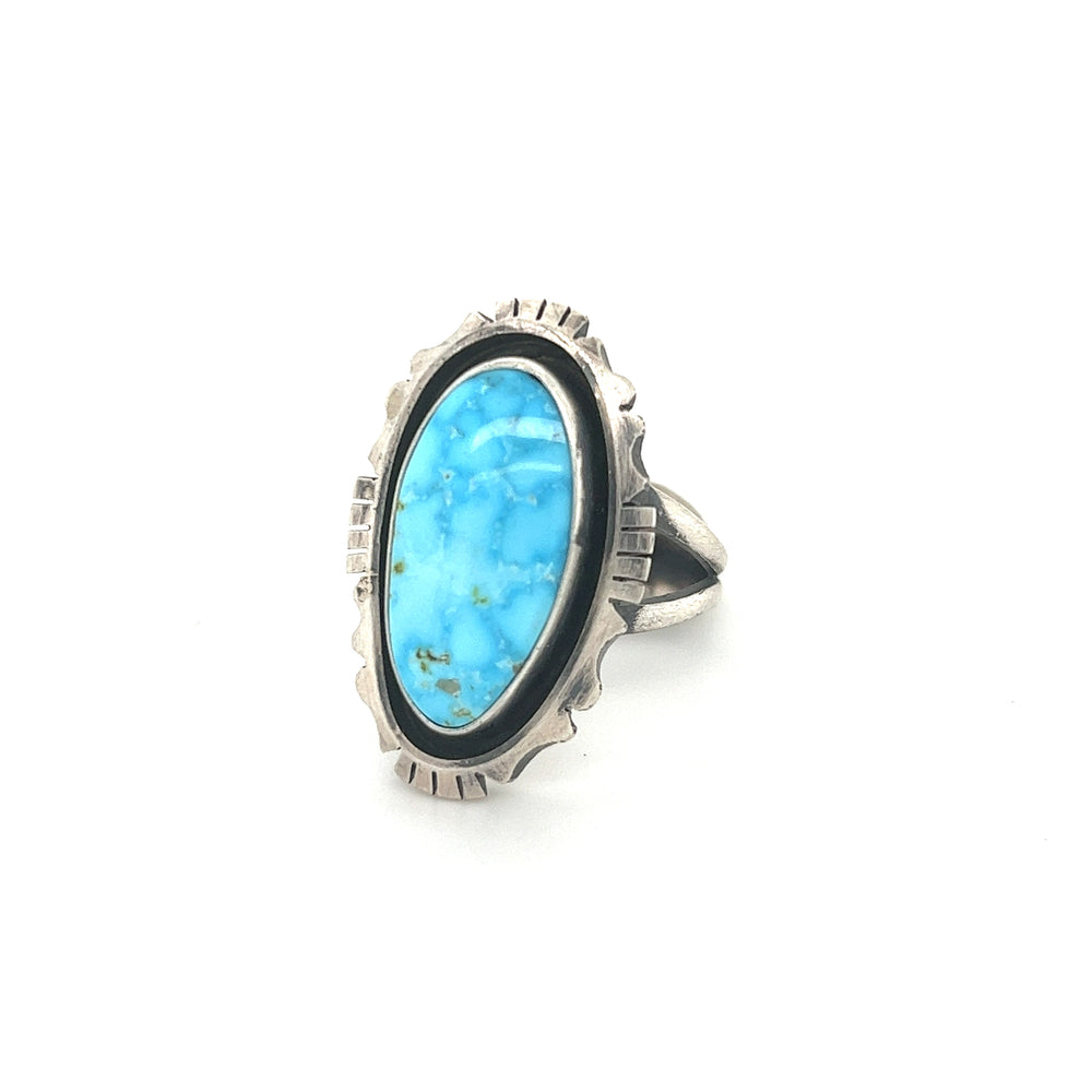 
                  
                    A Stunning Native American Turquoise Ring on a white background.
                  
                