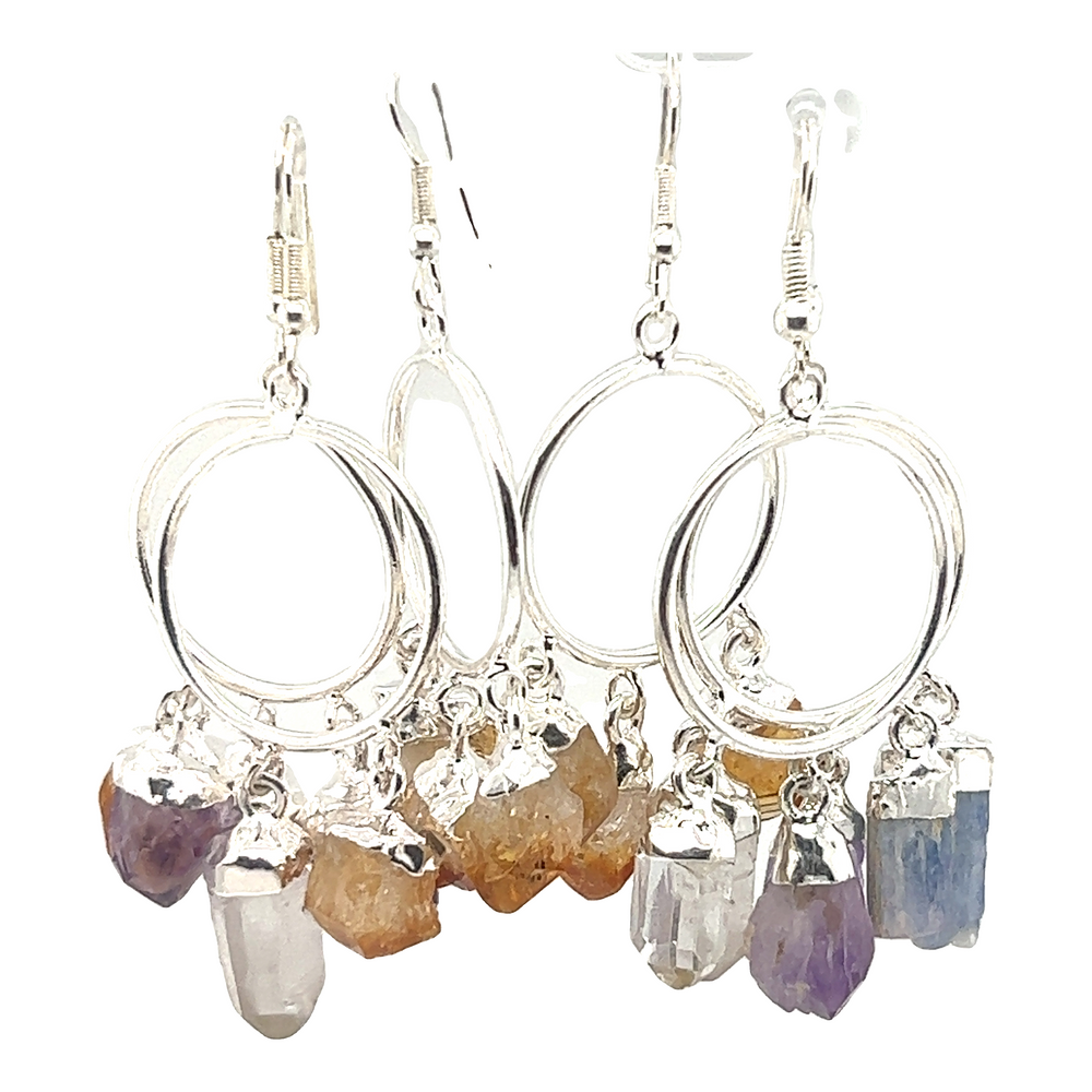A pair of Super Silver Boho Crystal Chandelier Earrings, exuding a bohemian feel.