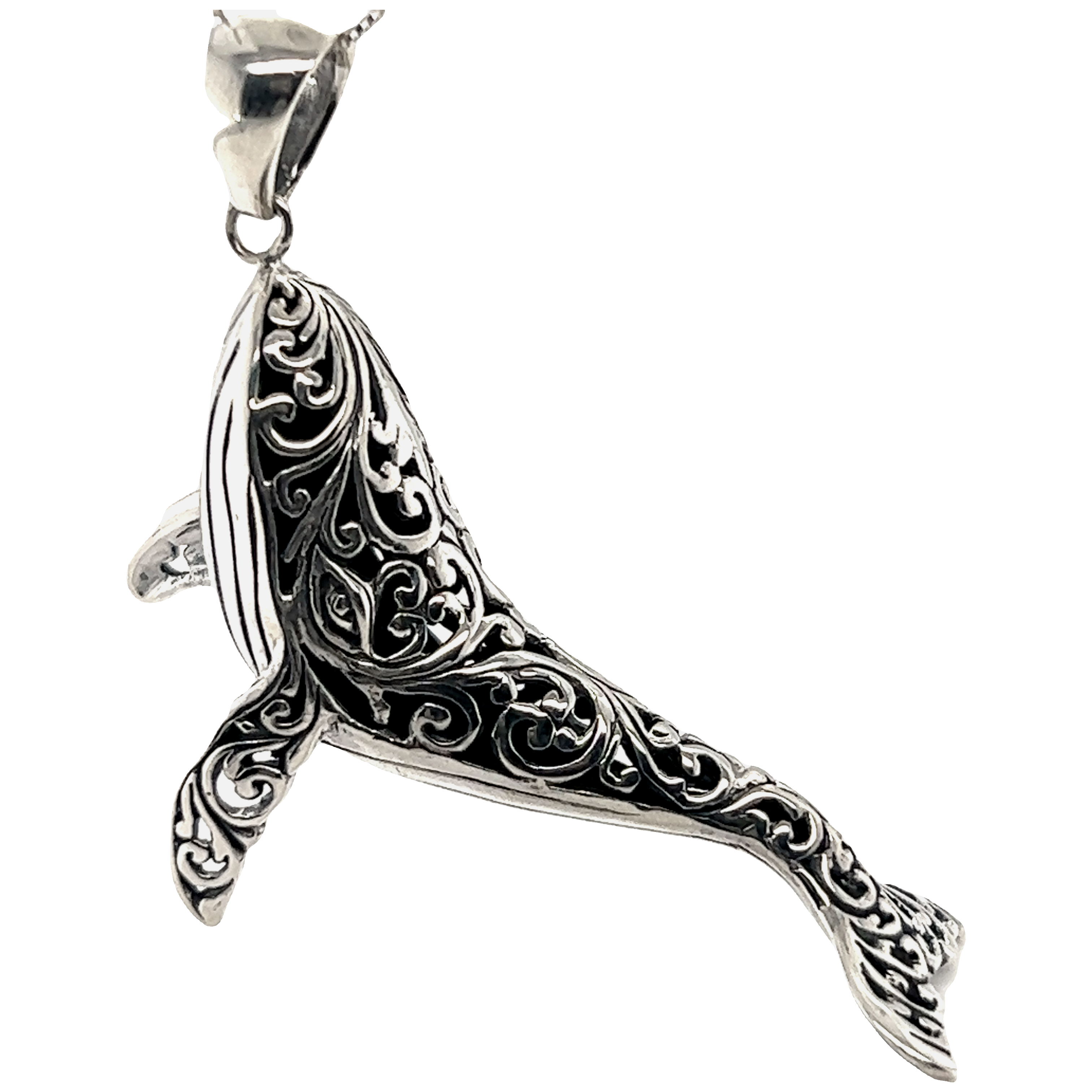 A Super Silver Magnificent Filigree Whale Pendant with an intricate ocean-inspired design.