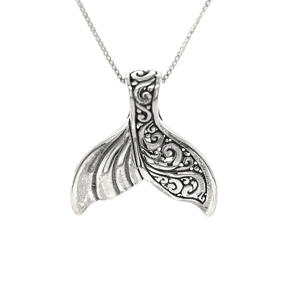 An Elegant Half Filigree Whale Tail Pendant on a chain inspired by the ocean from Super Silver.