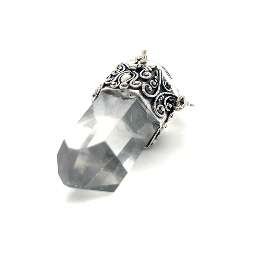 An ornate Super Silver pendant with a Phantom Crystal Poison stone, perfect for creating a statement jewelry line.