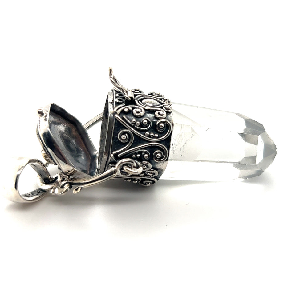 
                  
                    An ornate Super Silver Phantom Crystal Poison Necklace featuring a statement phantom quartz crystal.
                  
                