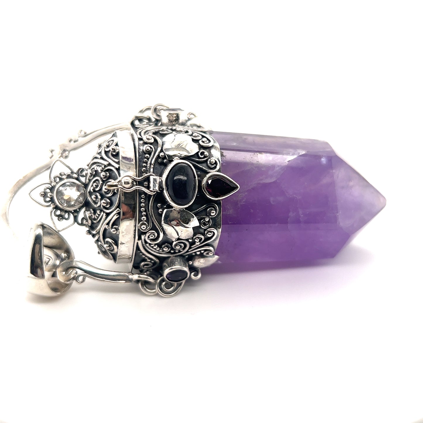 A statement necklace featuring the Super Silver Phenomenal Amethyst Poison Pendant.