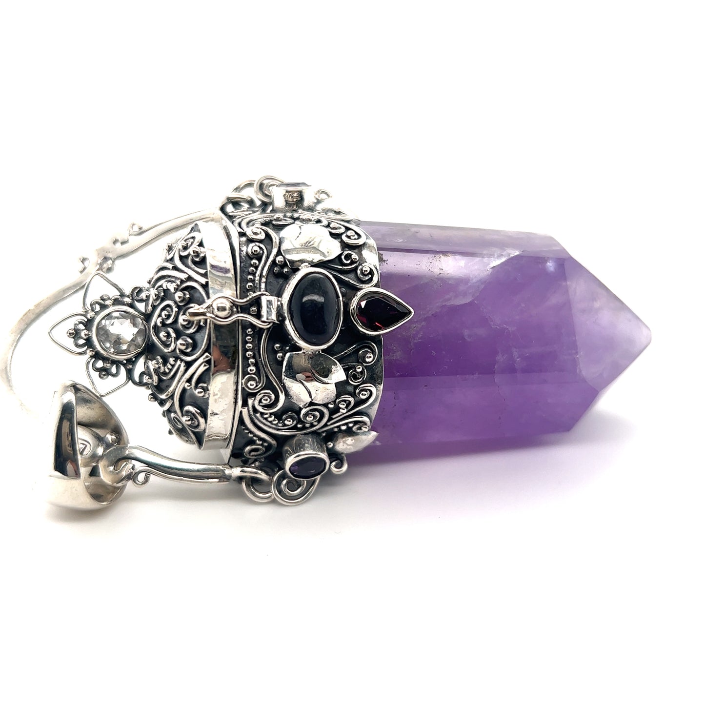 
                  
                    A statement necklace featuring a Super Silver Phenomenal Amethyst Poison Pendant.
                  
                