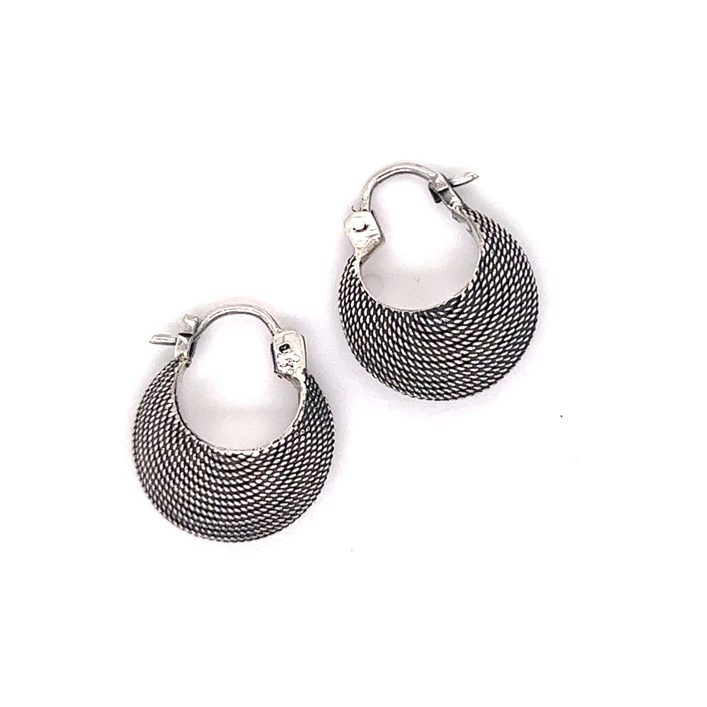 A pair of Dainty Bali Crescent Hoops from Super Silver, shaped like crescent moons on a white background.