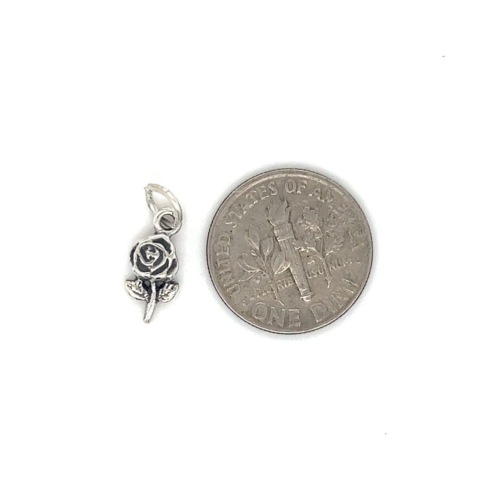 
                  
                    A Tiny Single Rose Charm from Super Silver, adorned with a beloved rose, symbolizing affection.
                  
                
