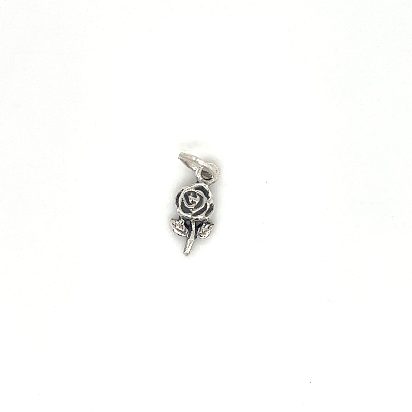 
                  
                    A small Super Silver Tiny Single Rose Charm on a white background, perfect for minimalist plant lovers.
                  
                