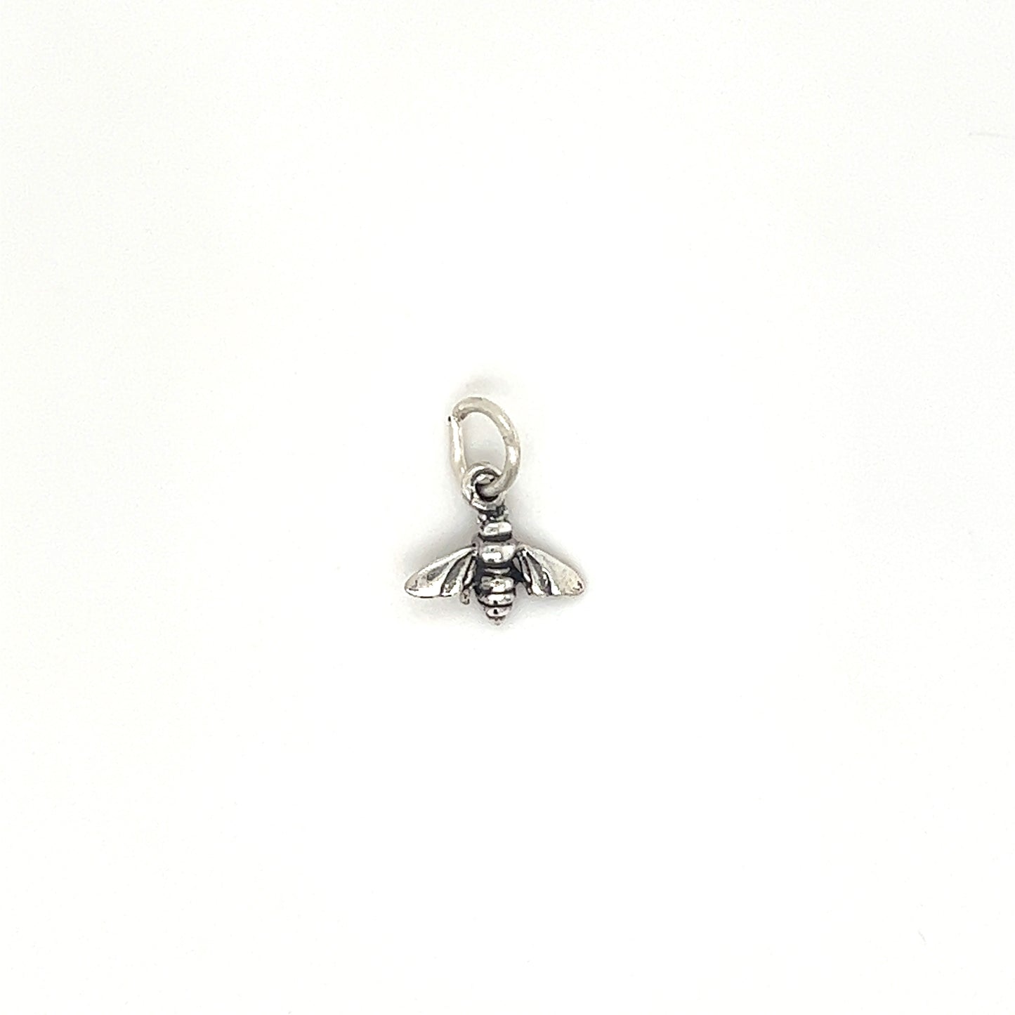 
                  
                    A Super Silver Tiny Bee Charm on a white background.
                  
                