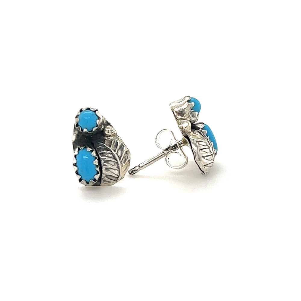 A pair of Handmade Turquoise Leaf Studs with sterling silver by Super Silver.