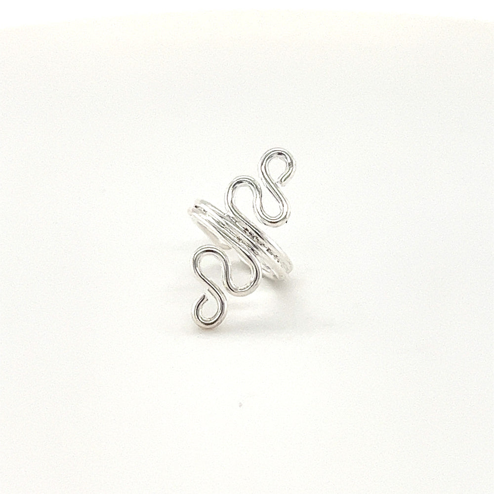This authentic Super Silver ear cuff showcases a stunning spiral design, exuding trendy bohemian vibes.