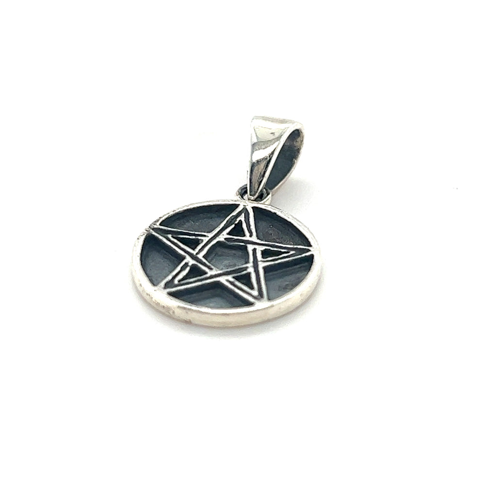 
                  
                    An antique Bewitching Delicate Pentagram Pendant with mystical detailing on a white background by Super Silver.
                  
                