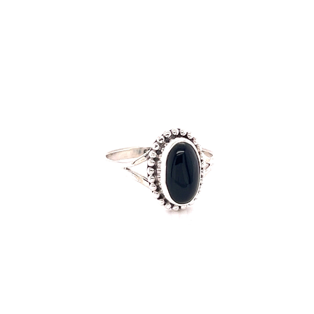 
                  
                    A Stylish Oval Gemstone Ring with Ball Border on a white background.
                  
                