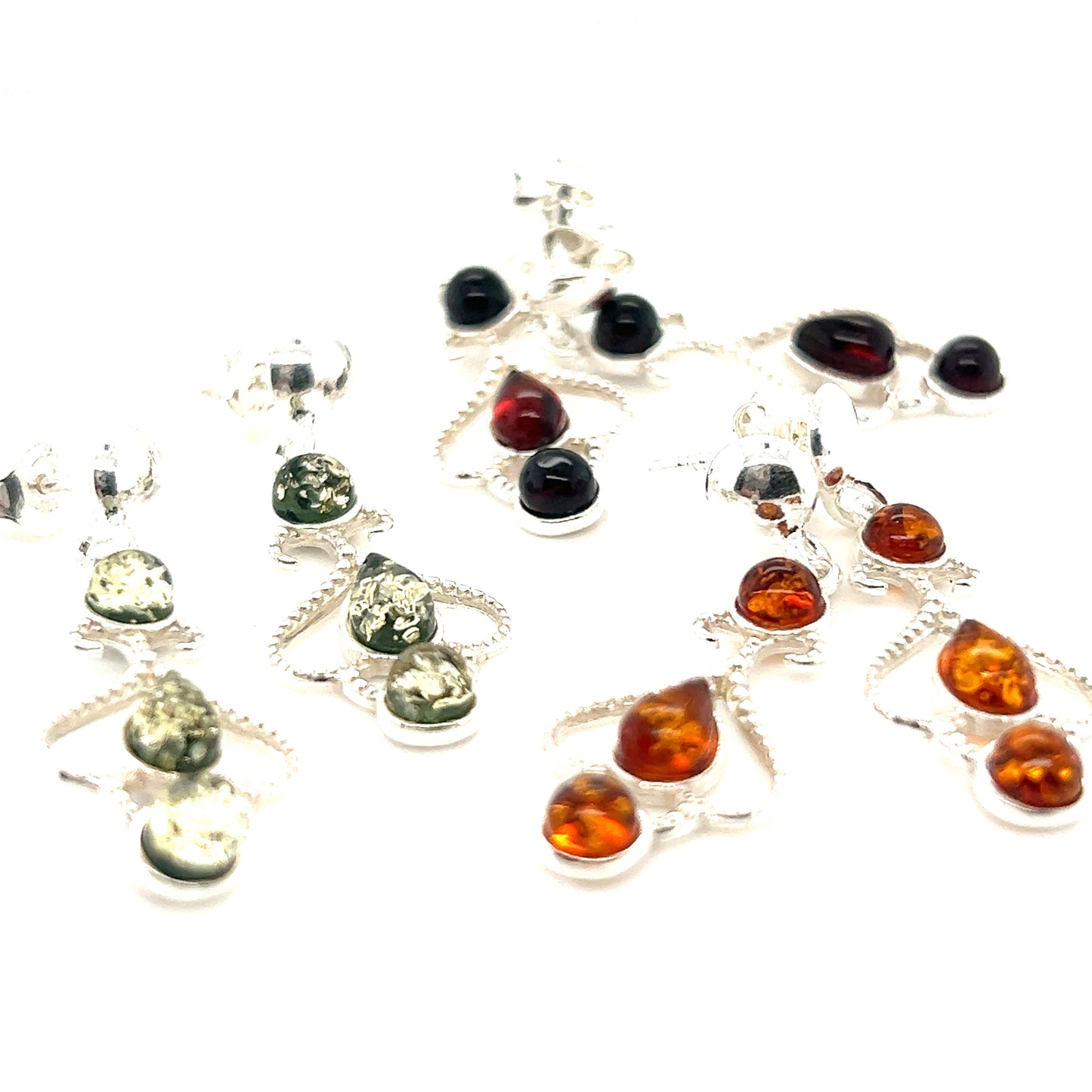 These Exquisite Baltic Amber Scroll Earrings from Super Silver will dangle elegantly from your ears.