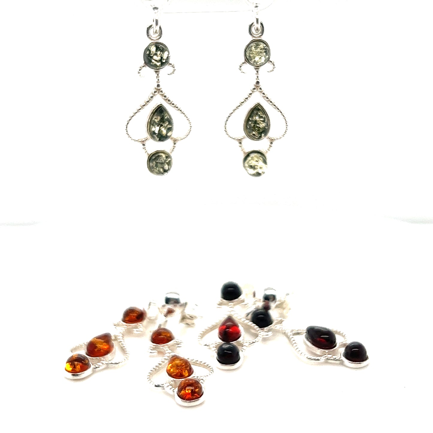 A pair of Exquisite Baltic Amber Scroll Earrings from Super Silver for a vintage look.
