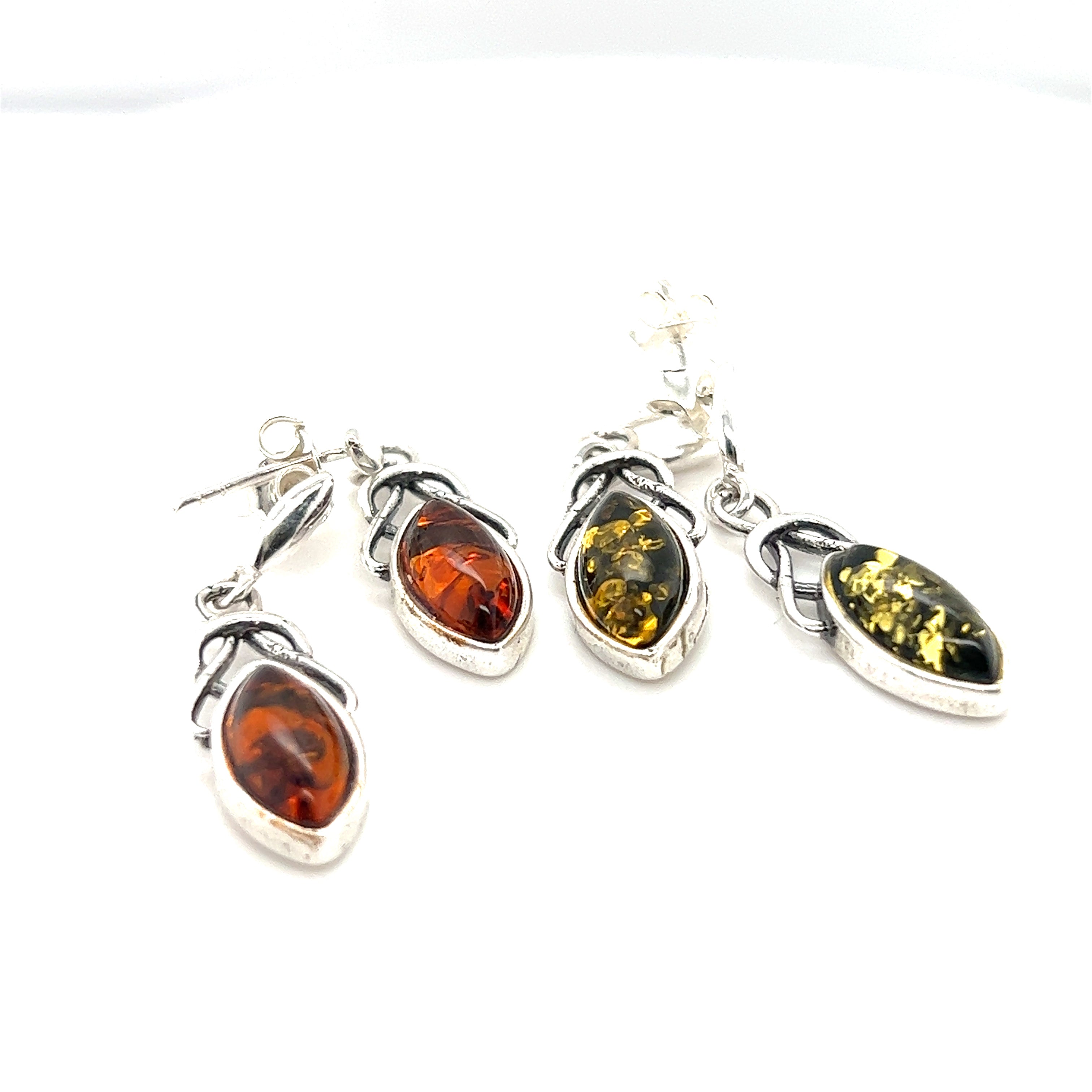 Timeless Marquis Shaped Baltic Amber Earrings from Super Silver, showcasing exquisite silver work and vibrant amber stones.